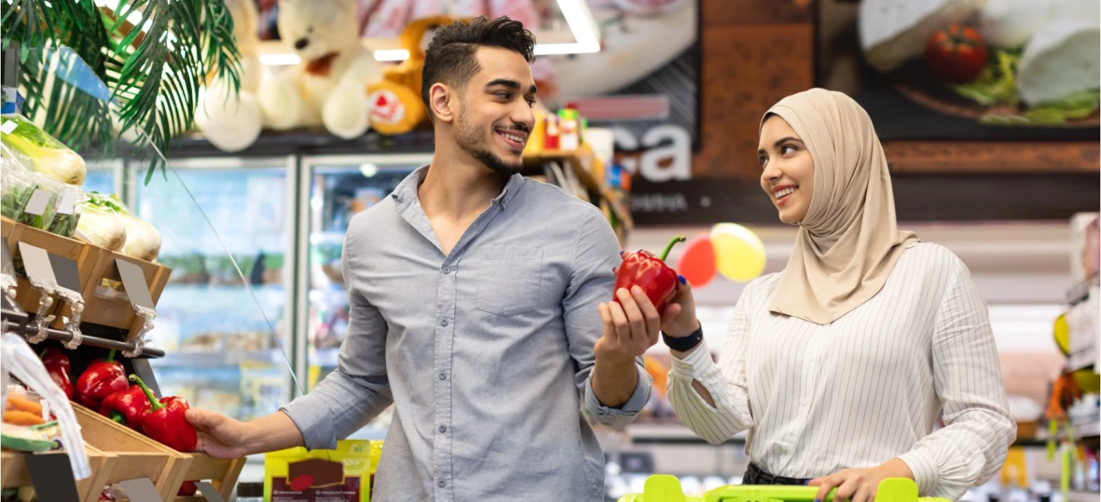 Couple doing grocery shopping in a supermarket
