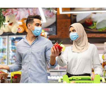 Customer buying product from al maya supermarket