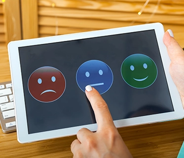 User giving online review on tablet
