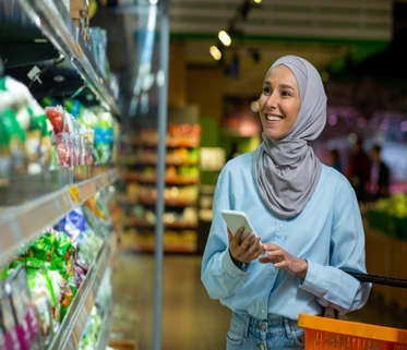Women is shopping at supermarket