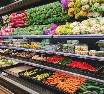 View of vegetable counter in supermarket - fruits and vegetables display